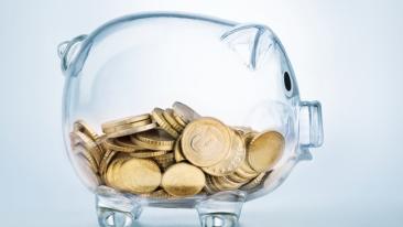 Pensions : une image montrant une tirelire cochon et des pièces de monnaie